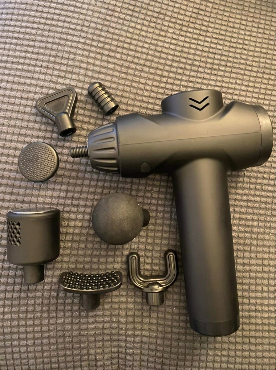 RecoverFit Hot & Cold Massage Gun – portable percussion massager with 7 heads